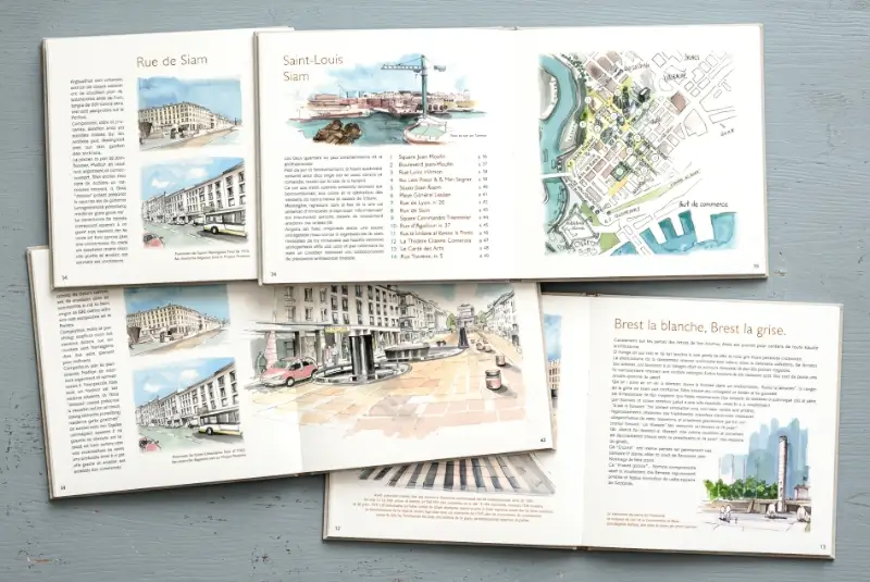 Pages intérieures ouvertes d'un livre d'art illustré présentant des aquarelles et cartes de la ville de Brest sur fond gris